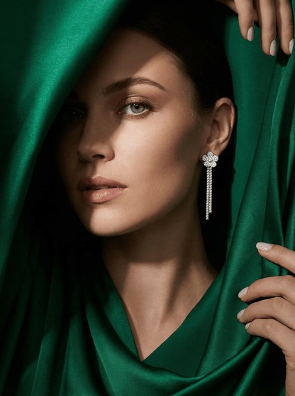 White diamond pave flower earrings with long diamond strands hanging