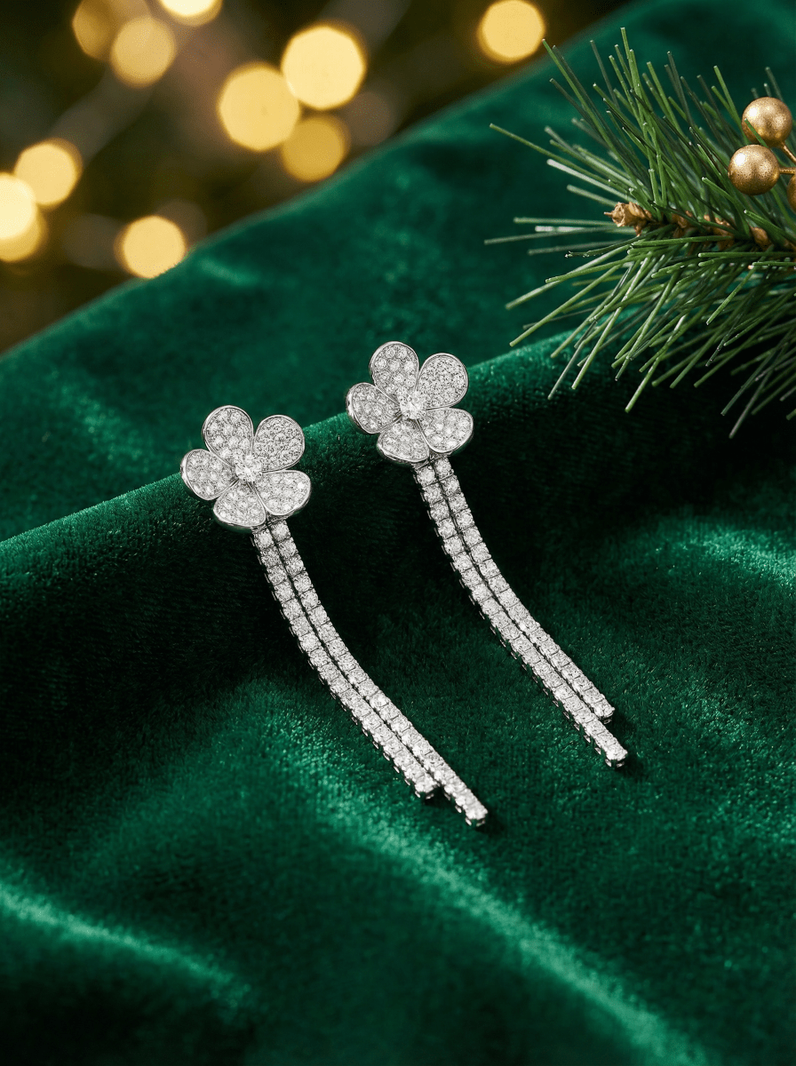 White diamond pave flower earrings with long diamond strands hanging