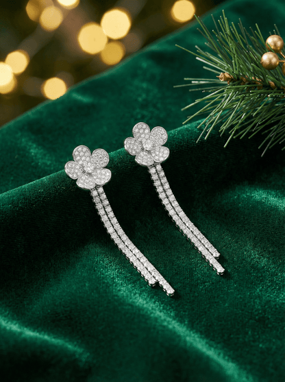 White diamond pave flower earrings with long diamond strands hanging